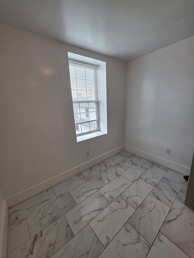 Photo - Modern 2-Bedroom Upper-Level Gem