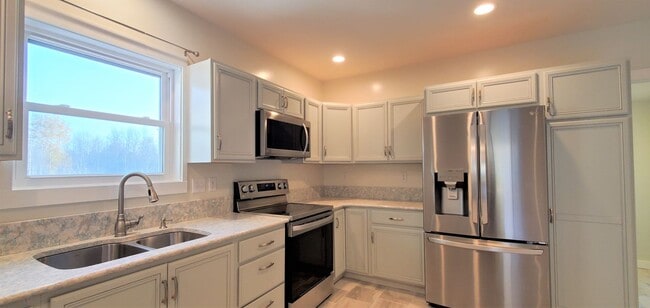 Photo - Renovated Farmhouse, 30+ Acres with Pole Barn!