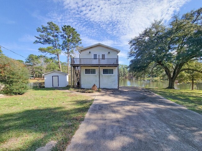 Photo - Escape to your updated 3-bed, 2-bath oasis in Goodrich, TX, featuring modern finishes, an open la...