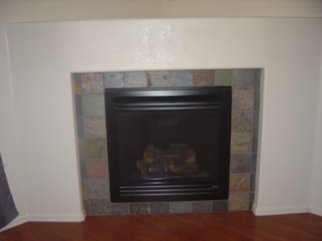 living room fireplace - 4147 Outlook Blvd