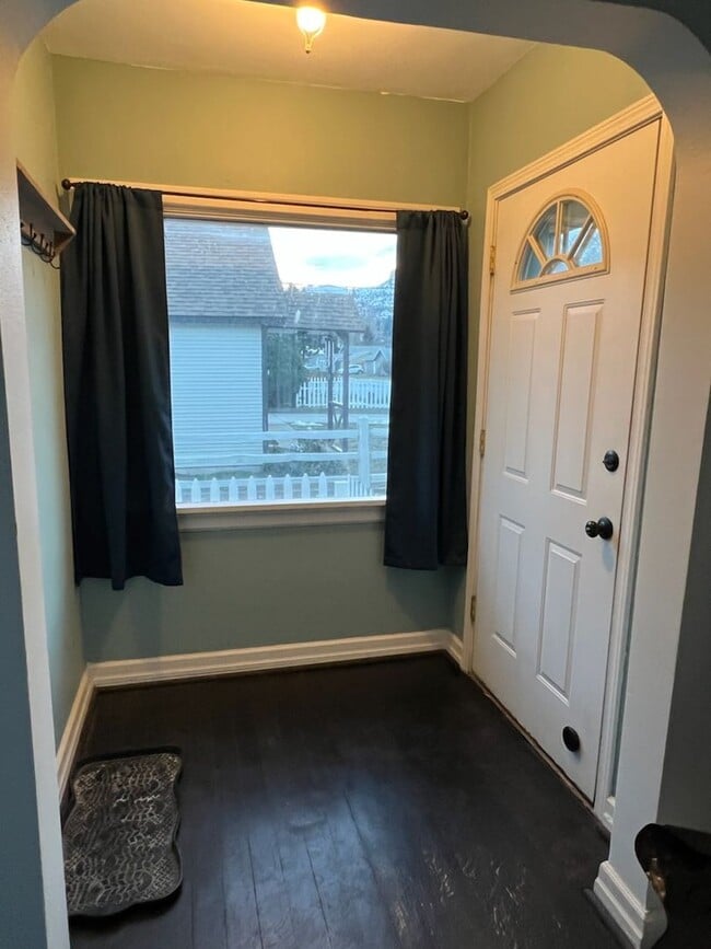 Photo - Spacious 3+ bed/2 bath home! Large fenced yard, garage, shed, w/d, a/c, d/w & more!