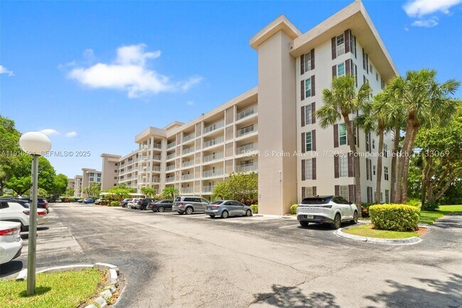 Building Photo - 2851 S Palm Aire Dr Unit 205