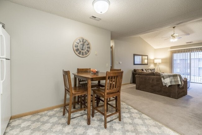 Gather for a meal, game night, or morning coffee in open dining areas that flow easily into your living space for everyday connection. - Fountain Glen
