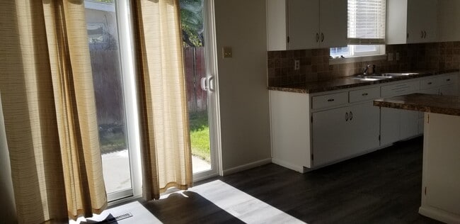 Photo - 3 bedroom, 1 bath rance style home on corner lot.