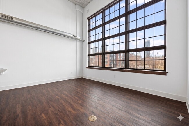Urban Loft Condo Featuring Stunning Views & Rooftop Entertaining