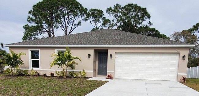 Building Photo - BEAUTIFUL 4/2 HOME IN PALM BAY