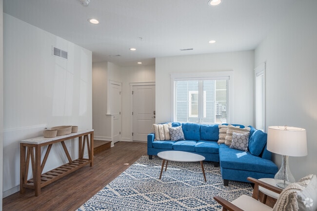 Bright living rooms - Cottage Grove at St. Mary's Townhomes