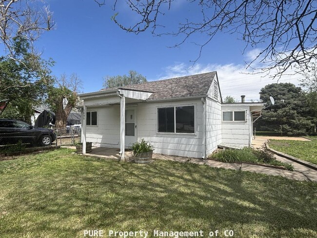 Photo - Cozy single family home with 1-car detached garage!