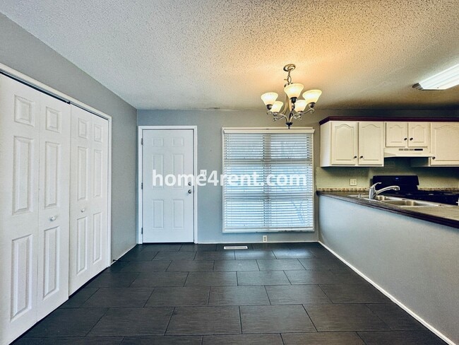 Photo - Charming Ranch Style, Prairie Village Home w/ a Fenced Yard, Updated Baths, and All Appliances In...