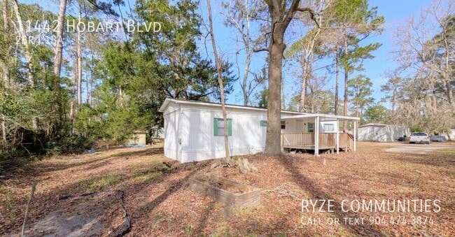 Photo - 11442 Hobart Blvd