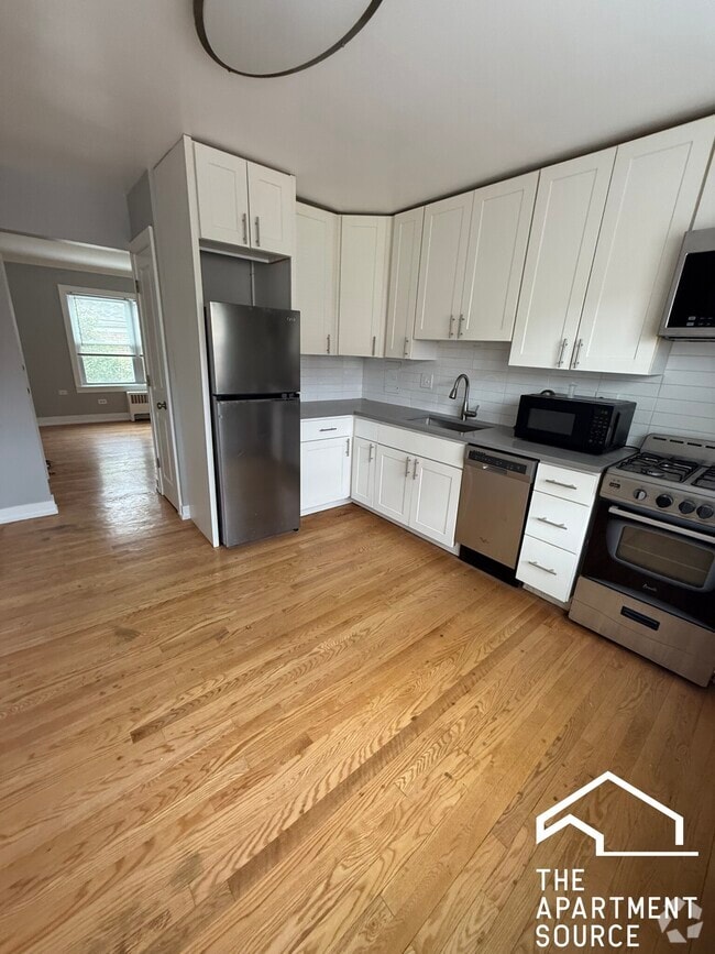 Building Photo - 6735 N California Ave Unit 2W Rental