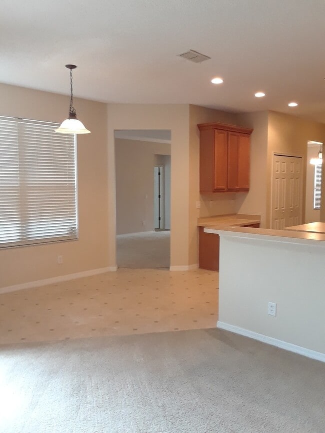 Photo - Spacious 4-Bedroom Pool Home with 3-Car Ga...