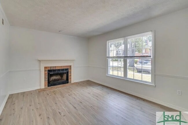 Photo - Spacious 2-Bedroom Brick Townhome with Private Fenced Yard