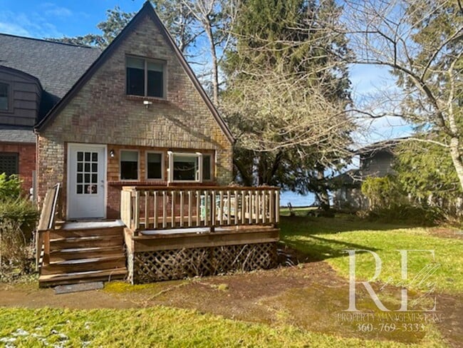 Building Photo - Waterfront Tudor | Private, Vintage Charm with Casita