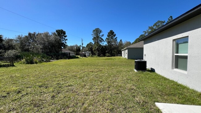 Photo - Discover the 3 BD/2BA Home in Beautiful Palm Bay!! Alexa Enabled SMART HOME!