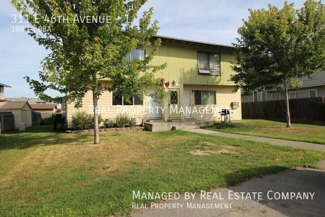 Building Photo - 311 E 46th Ave Unit 1