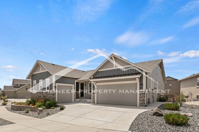 Building Photo - Elegant Ranch-Style Home with Main Floor Primary Bedroom with 3-Car Garage and Finished Basement ...