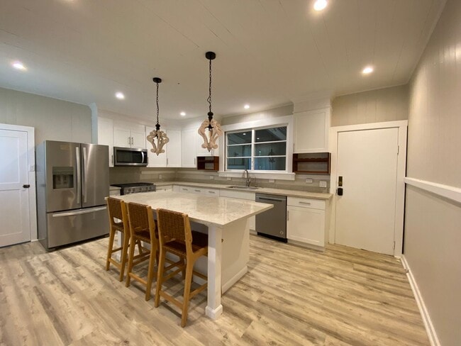 Photo - Furnished Plantation Home with 3 Bedrooms, 2 Bath large enclosed porch on almost 2 acres with oce...