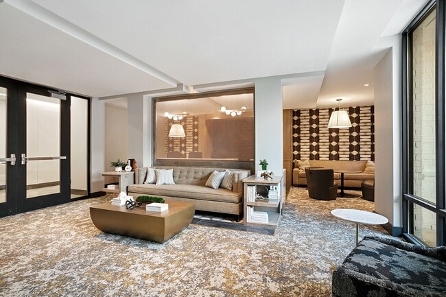 Multi-use business lounge with private work stations, conference room and co-working areas