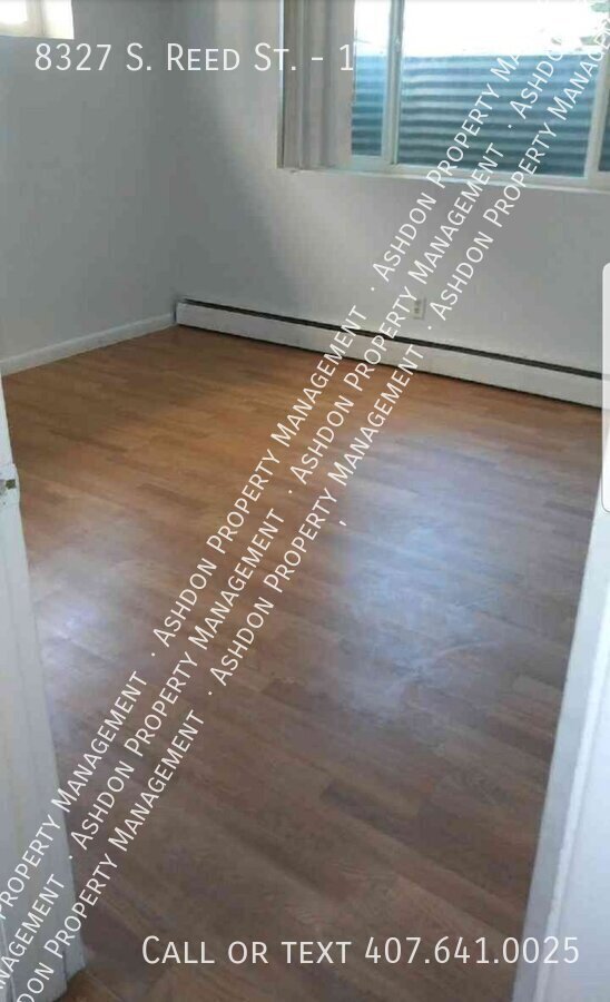 Building Photo - 8327 S Reed St Unit 1