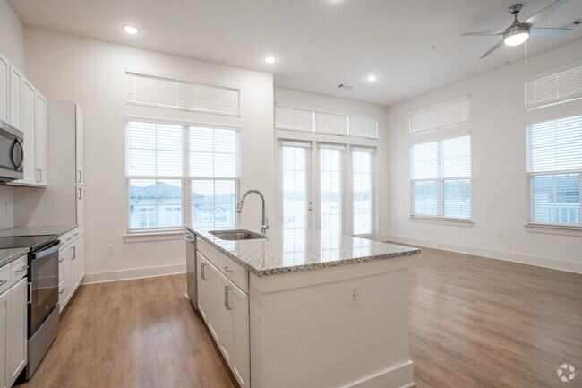 3BR, 2BA - 1,403SF - Kitchen - The Quincy Apartments