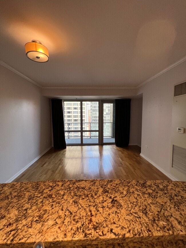 empty living room - 160 E Illinois St Unit 1604
