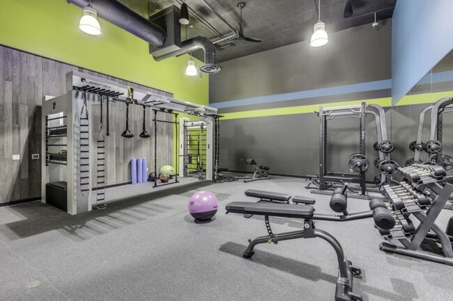 Fitness center with weight training and break out area