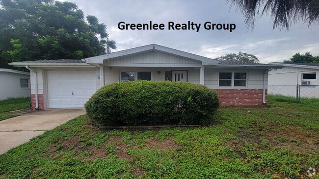 Building Photo - Updated - 3 Bed/2 Bath House with Garage