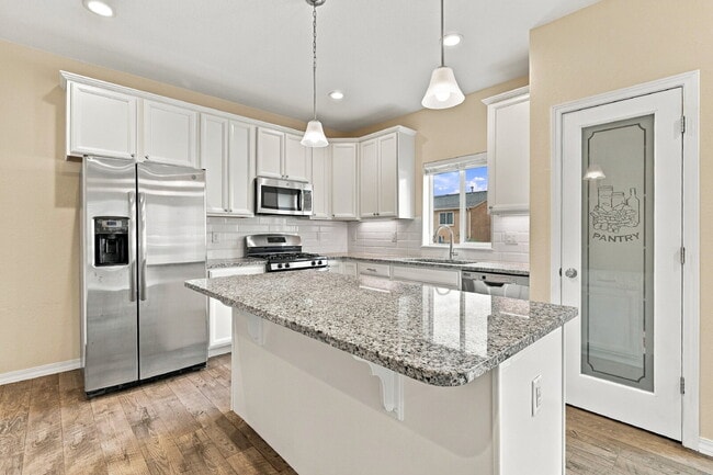 $2,445.95 - 4 Bed, 2.5 Bath Townhome with Attached Garage and Central AC!