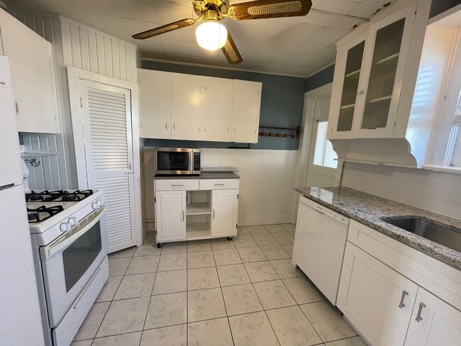 Photo - Charming 1 Bed + Bonus Room Near Cultural District — Hardwoods, Fireplace & Sunroom! Unit 4800 Bryce Ave #3