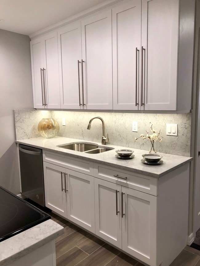 Quartz Countertop/Backsplash - Fairfield Square at East Meadow Apartments