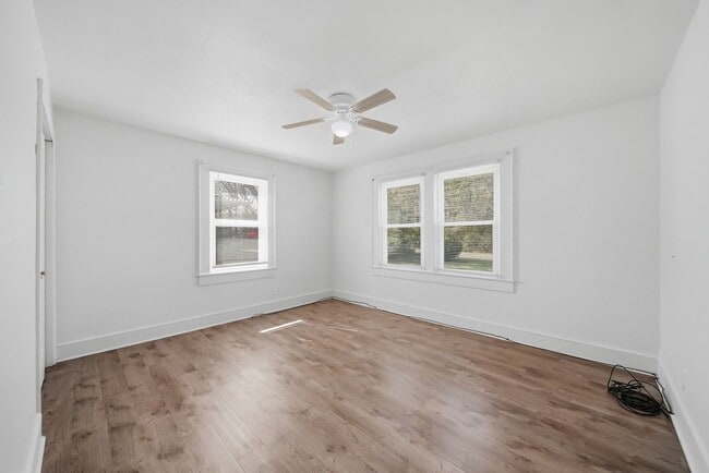 Photo - Charming 2BR Ranch with Spacious Yard & Ample Parking