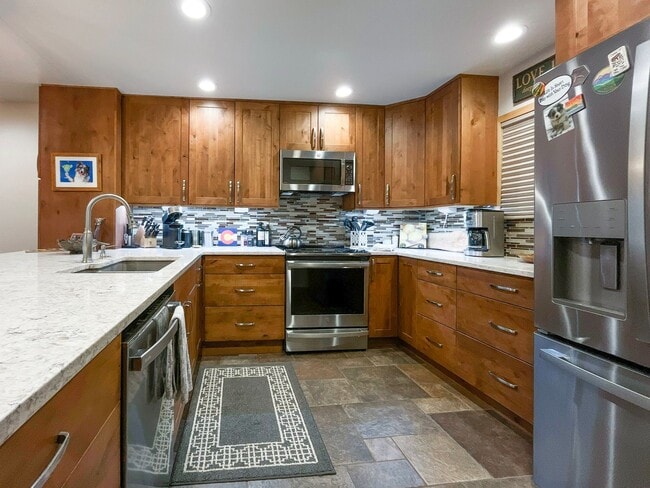 Photo - Walk to Town, Overlooking Carter Park, Garage Parking - Updated 2 Bed/2 Bath Available Now for Sk...