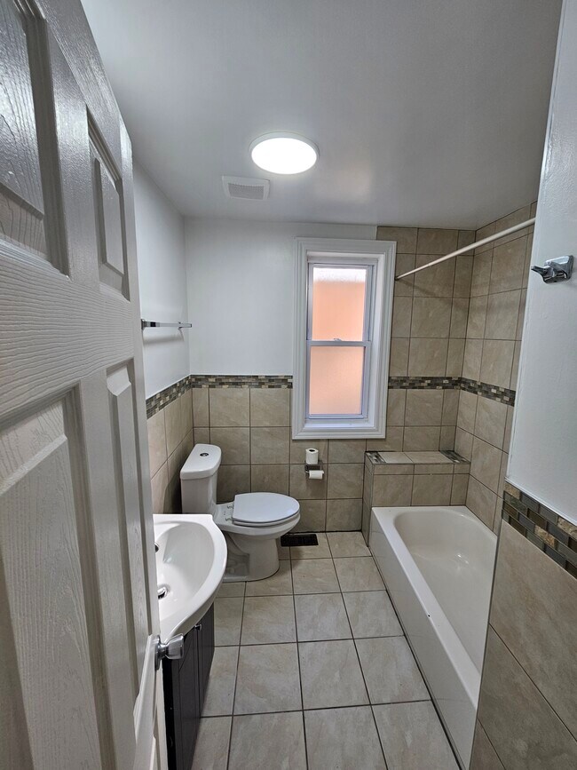 Photo - 8539 S Colfax Ave Unit First Floor  1