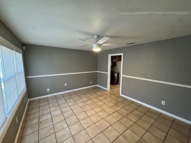 Photo - "Spacious 5-Bedroom Haven with 2 Full Baths in Tampa's Heart – 1656 Sq Ft of Comfort!"