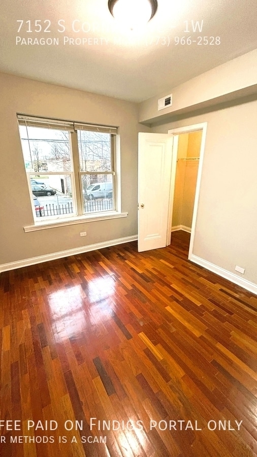 Building Photo - 7152 S Cornell Ave Unit 1W