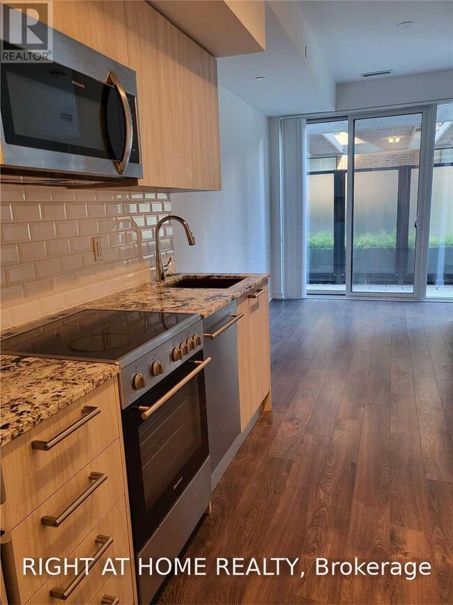 Photo - 28 Wellesley St E Unit 207