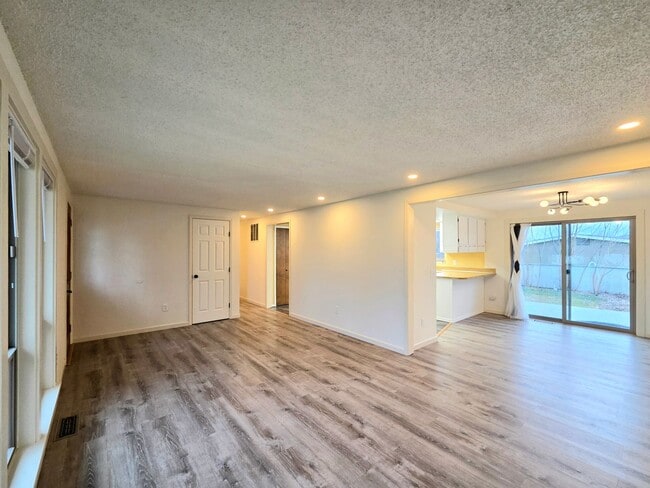 Photo - 3 Bed / 2 Bath Rambler – Huge Fenced Yard + 2-Car Garage – Available Now