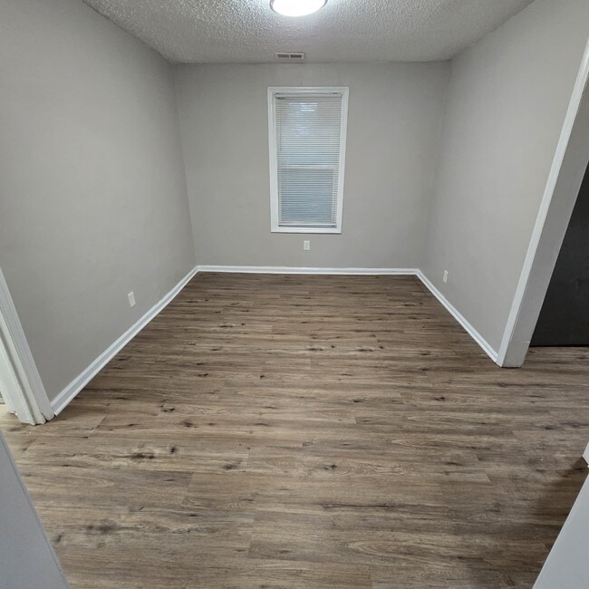 Photo - Full brick 3 bedroom, 1 and half bath home with screened in side porch, and an attic for extra st...