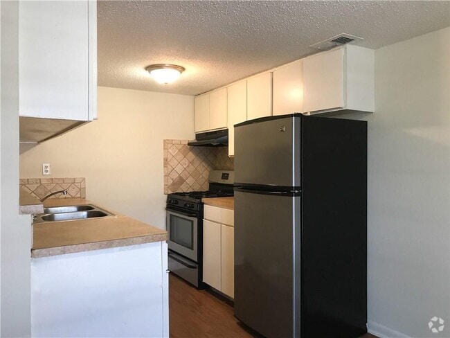 Building Photo - 4709 Harmon Ave Unit 408 Rental