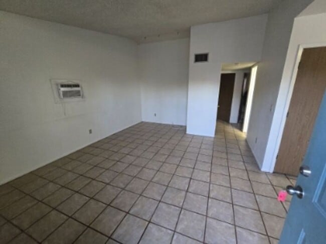 Photo - TRIPLEX 2BD/1BA COMING SOON!!! SPACIOUS BACKYARD!!