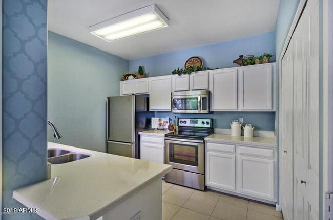 Building Photo - 11260 N 92nd St Unit 1036