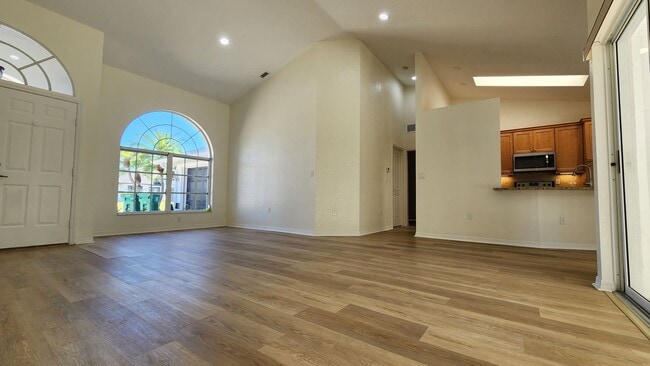 Photo - Fresh Paint, New Floors, and a Heated Pool...
