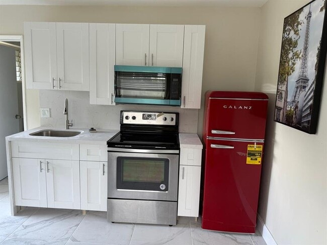 Building Photo - 841 NW 39th St Unit 4 Rental