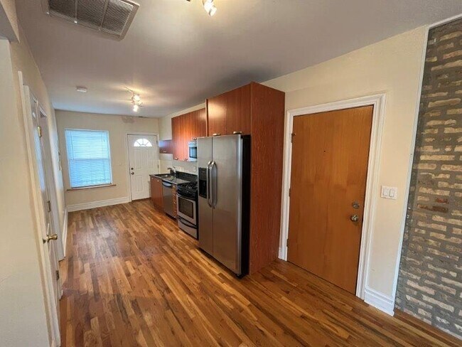 Building Photo - 3650 W Berteau Ave Unit 3 Rental