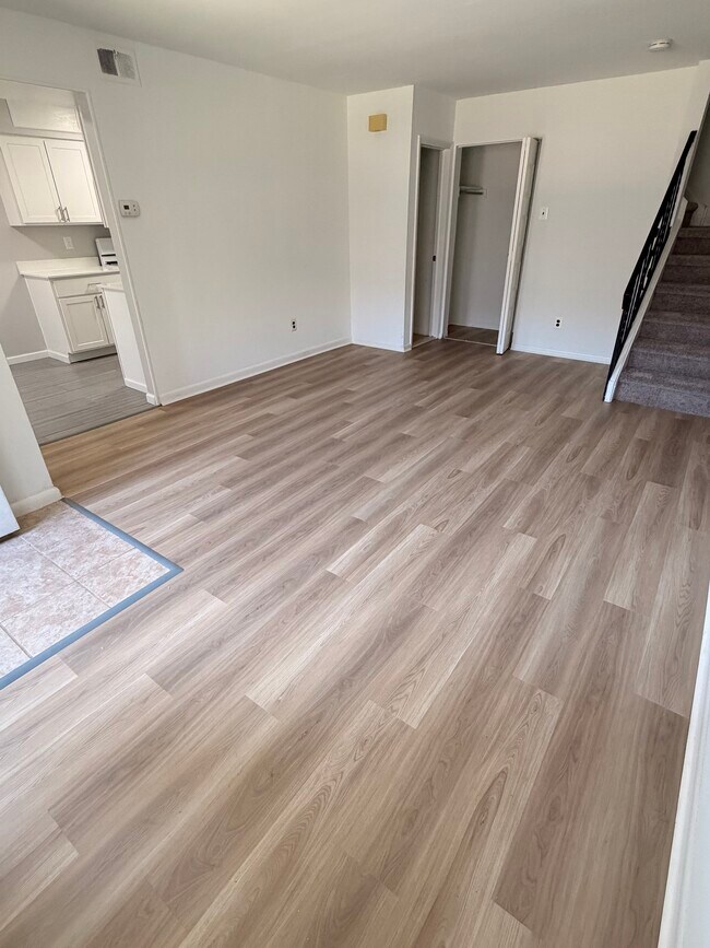 Living Room with Coat Closet and Powder Room