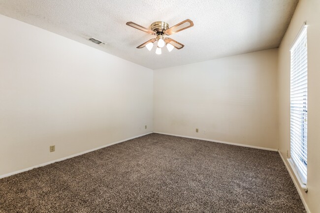 Photo - Charming 2BR/1BA Sherman Townhome with Private Fenced Backyard – Move-In Ready