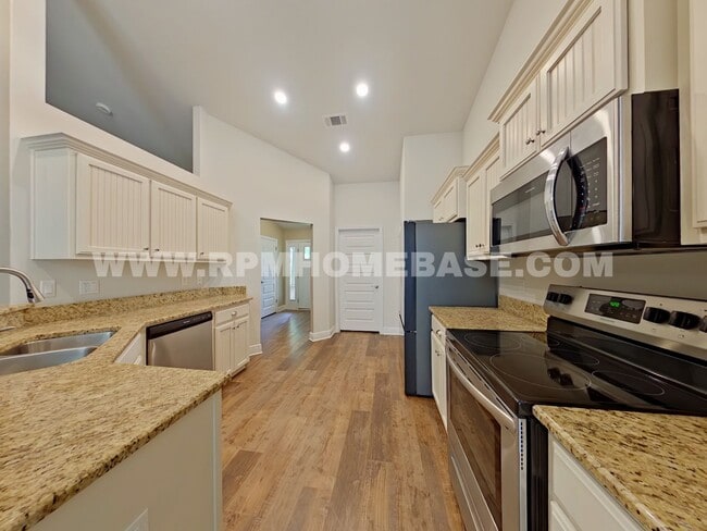 Photo - 4/2 in North Crestview: Screened Porch, Fenced Yard, Near Top Schools
