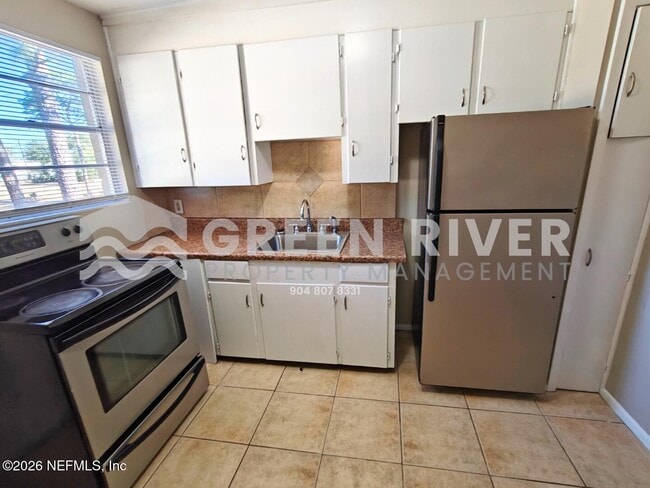 Building Photo - 11620 Charlie Rd Unit 4