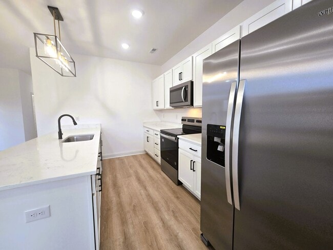 Photo - Beautiful new built three-bedroom, two-bat...